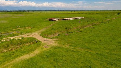 Naklejka premium Pastures around a small farm, in the Kakheti region, Georgia. Spring 2019