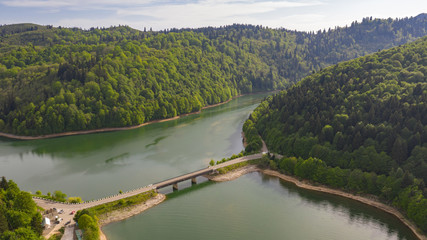 Fototapeta premium Racha is one of the mountain regions of Georgia. Shaowi Reservoir. Near the town of Ambrolauri. Caucasus Mountains. Spring 2019