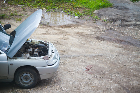 Broken car on the road