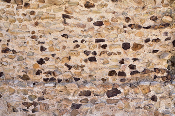 antique masonry from the stones of the dilapidated walls of buildings