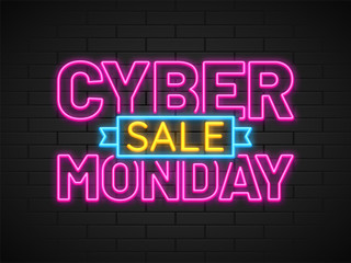 Fototapeta na wymiar Neon text Cyber Monday Sale in pink and yellow color on brick wall background.