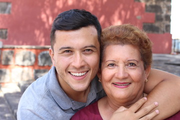 Hispanic senior woman with her son 