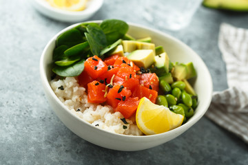 Salmon poke bowl with avocado