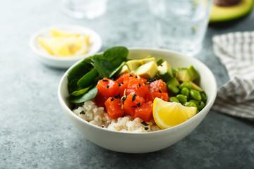 Salmon poke bowl with avocado