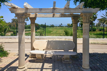 Empty bus stop with columns of Tunisia