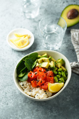 Salmon poke bowl with avocado