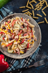 Fusilli pasta salad with smoked turkey