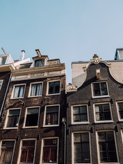 The typical elongated, crooked and charming rows of houses in Amsterdam.