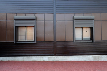 Obraz na płótnie Canvas Wood windows on brown wall at Yufuin, Oita, Kyushu, Japan.