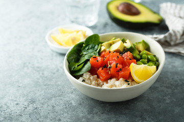 Salmon poke bowl with avocado