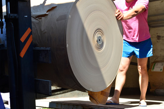 forklift loader caring paper roll