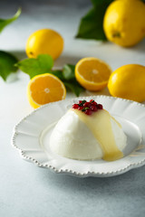 Homemade panna cotta with lemon curd