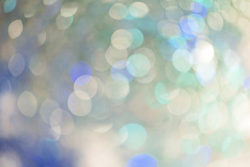 Obraz premium Silver,blue and light blue bokeh. Abstract background.