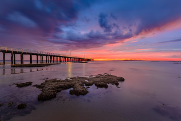 Naklejka na ściany i meble Sunrise at Point Lonsdale Lighthouse and jetty, Bellarine Peninsula, Victoria, Australia.