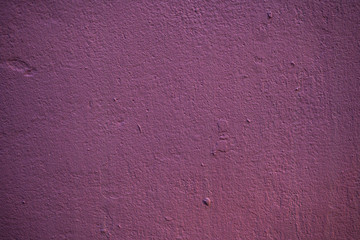 Fototapeta premium Texture of an old wall covered with paint. Background image of a worn paint coated surface