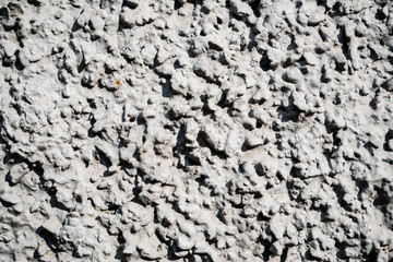 Texture photo of white rough concrete plaster