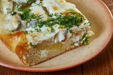 Siberian pie with fish and potatoes