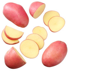 Raw red potato with slices isolated on white background. top view