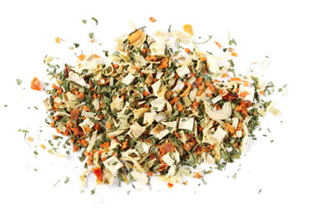 Dry cut and chopped up vegetables mix, spice isolated on white background, top view