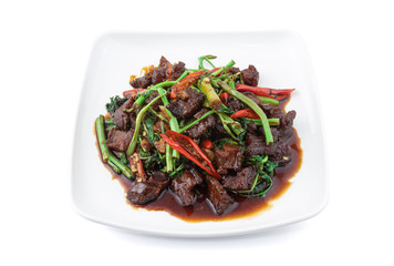 Stir-fried water mimosa with crispy pork isolated on white background with clipping path