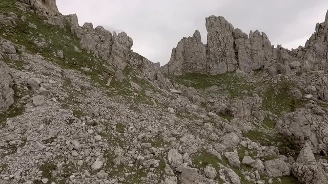 Aerial shot during beautiful excursion hiking trail "Vial de le Feide" or "Sentiero delle Pecore" Italy. UNESCO World Natural Heritage. Italy Val Di Fassa