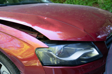 Auto accident involving two cars on a city street - Image