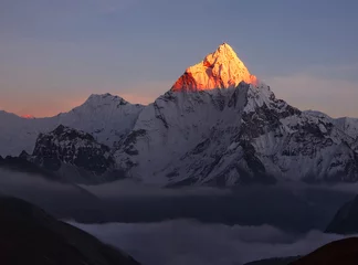 Foto op Plexiglas Ama Dablam Last rays of sun at sunset mount  figuratively, the disappearance of hope, dissolution of all light in the dark, the victory of the forces of darkness over the forces of light. Ama Dablam peak (6856m)