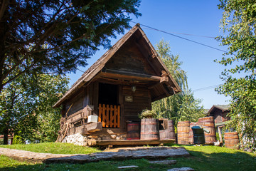 Old vintage wooden houses in ethno village Stanisici near the Bijeljina in Bosnia and Herzegovina