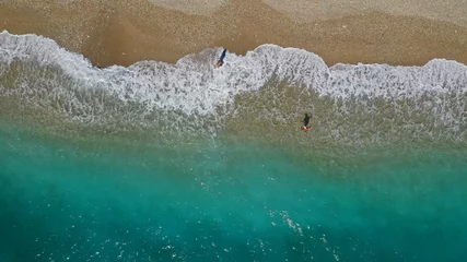 Zelfklevend Fotobehang Aerial drone top down photo of tropical exotic sandy bay with emerald sea and waves © aerial-drone