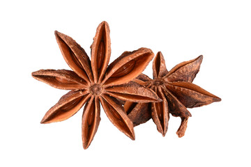 Star anise spice. Two dry star anise fruits isolated on white background without shadow. Macro close-up top view of illicium verum or chinese badiane.