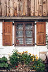 old window with flowers