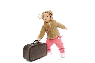 Baby's got a suitcase on a white background