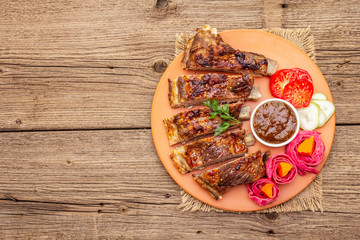BBQ pork ribs with fermented, baked and fresh vegetables