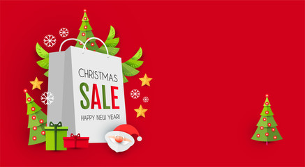 Christmas Sale design template with cute papercraft Santa Claus, shopping bag and holiday decoration.