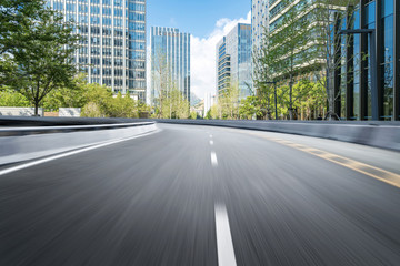 Obraz premium empty highway with cityscape and skyline of qingdao,China.