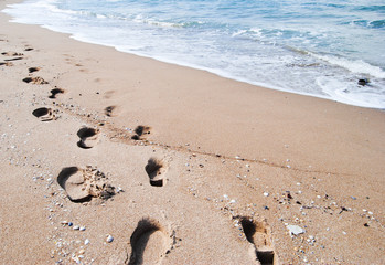 Footsteps on Empty Beach
