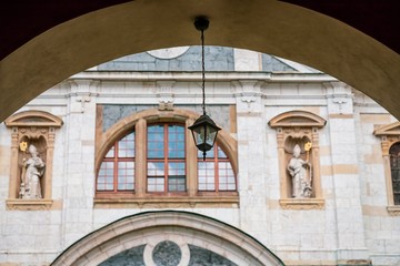 Obraz premium Lantern on window background. Details. Church of the Assumption of the Blessed Virgin Mary in Krakow, Poland