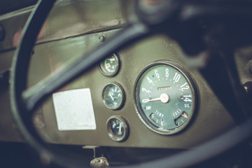 Close Up of vintage car gauge meter showing speedometer - 294381981