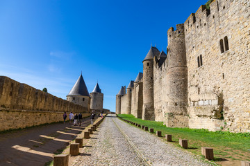 Fototapeta na wymiar View between the walls of the medieval old town of Carcassonne in France