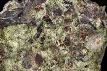 Manganoneptunite. The mineral forms dark red prismatic crystals up to 7 cm in length.