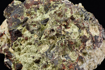 Manganoneptunite. The mineral forms dark red prismatic crystals up to 7 cm in length.