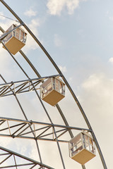 Ferris wheel. Amusement park. Ferris wheel cabins