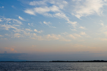 Background of colorful sky concept: Dramatic sunset with twilight color sky and clouds