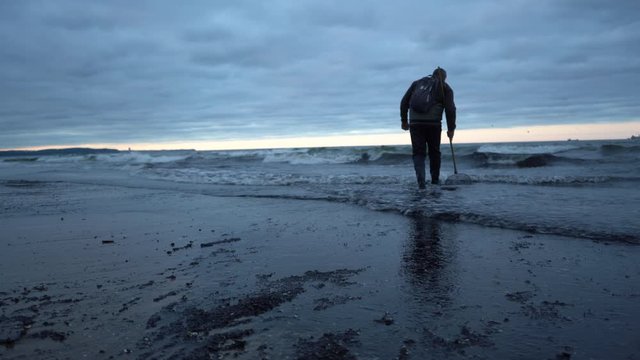 Baltic Sea, Gdansk, Poland - September 2019: Amber catchers during a storm on the Baltic Sea. People are looking for amber, which make waves during a storm.