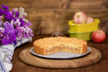 Apple pie or homemade cake with apples on table. Delicous dessert apple tart.