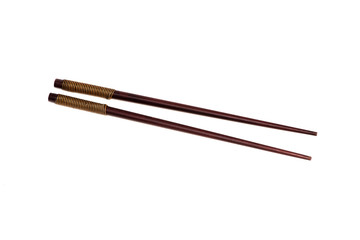 Wooden chopsticks isolated on the white background.