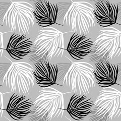 Ultimate Gray seamless floral pattern. tropical print of coconut palm branch. black and white leaves on a gray background.