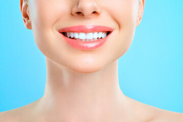 Obraz premium Perfect healthy teeth smile of a young woman. Teeth whitening. Dental clinic patient. Stomatology concept.
