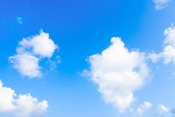 Nature Bright blue Sky with white clouds on blackground. Beautiful sky and clouds in the afternoon.