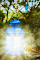 beautiful ceramic lamp in the park on nature background